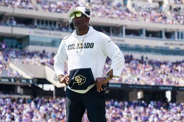 Deion Sanders on the field at Amon G. Carter Stadium
